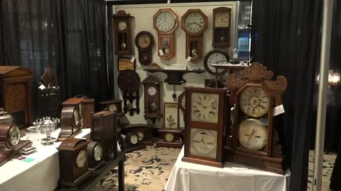 Clocks in a booth at a trade show. Stock Footage 132520541