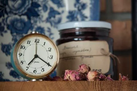 Clocks on the shelf Stock Photos