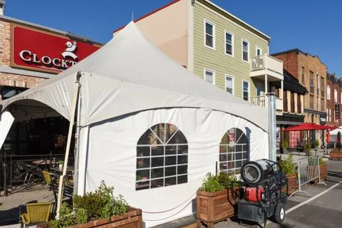 The Clocktower Brew Pub in Canada with a tent and portable heater Stock Photos