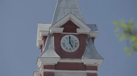 Clocktower minutehand strikes 5 sharp Stock Footage 24329721