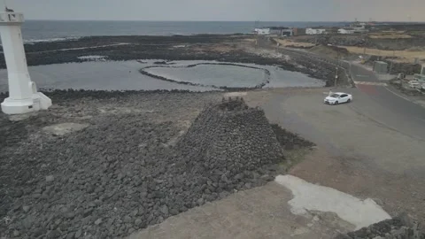 Clockwise Aerial View of "Mangru" (Watchtower), Udo Island. Stock Footage 146067264