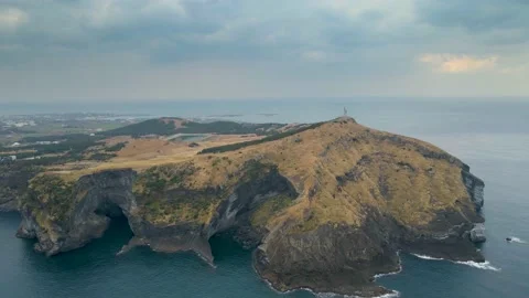 Clockwise View of S/W Cliffs of Soemeori Oreum, Udo Island, Jeju. Stock Footage 146067402