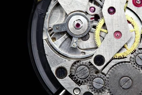 Clockwork Clockwork macro isolated over the black background Copyright: xZ... Stock Photos