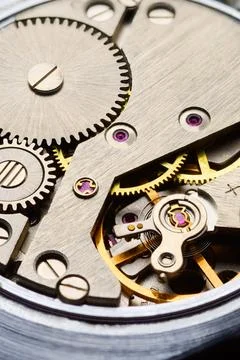 Clockwork gears inside Stock Photos
