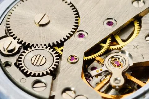 Clockwork gears inside Stock Photos