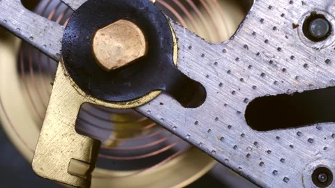 Clockwork mechanism rotating, close-up view of intricate gears Stock Footage 310521156