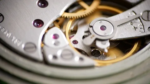 Clockwork Mechanism Works with Spring and Metal Cogs. 스톡 동영상 122339165