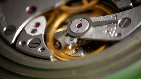 Clockwork Mechanism Works with Spring and Metal Cogs. Video stock 122339187