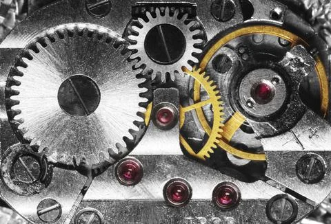 Clockwork of the metallic mechanical watch close-up Stock Photos