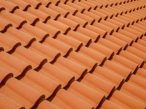 Clode up of Red tiles pattern on traditional roof. Abstract background Stock Photos