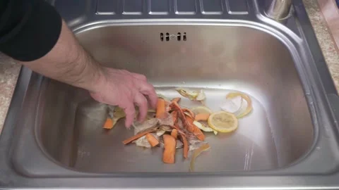 Clogged drain. Kitchen sink clogged with food residue Stock-Footage 310539711