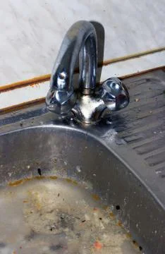 A clogged kitchen sink Foto stock