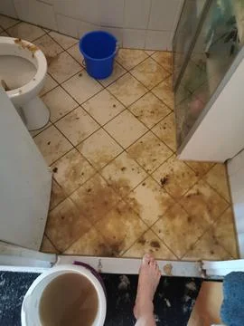 Clogged sewage drain pipe, causing a damage Stock Photos