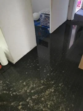 Clogged sewage drain pipe, causing a damage Stock Photos