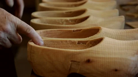 Clogs waiting to be painted Stock Footage 46995591