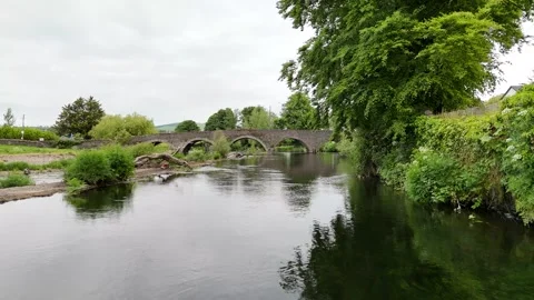 Clohamon Bridge Ancient Stone Arch Over River Slaney 4K 60fps Stock Footage 325671447