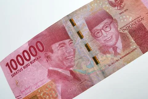 Close up of the 100 thousand rupiah banknote. Close up view of Soekarno and H Stock Photos