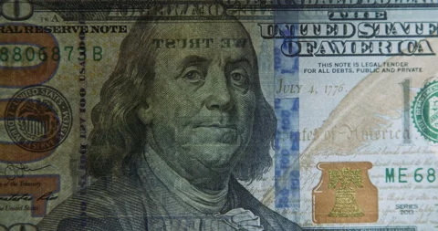 Close-Up of 100 US Dollar Banknote Verified with Light for Authenticity 库存影片 341446753