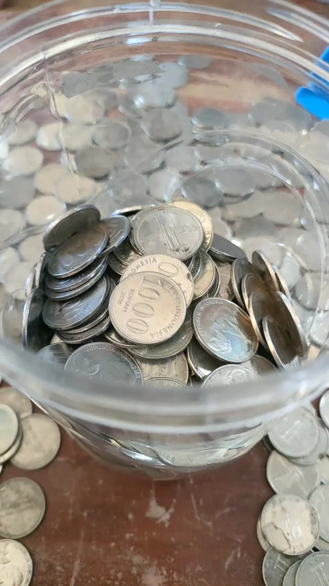 Close-Up of 1000 Rupiah Coins Stock Footage 339517470
