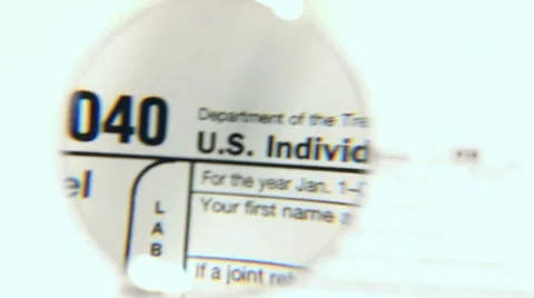 Close-up 1040  tax form Stock Footage 8623158