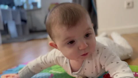 Close Up 2 Baby Lying on Their Tummy Video stock 278680830