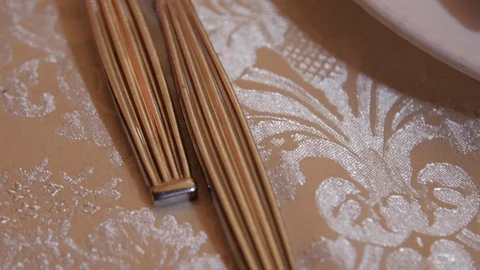 Close up 2 forks on fance table cloth Stock Footage 102771808