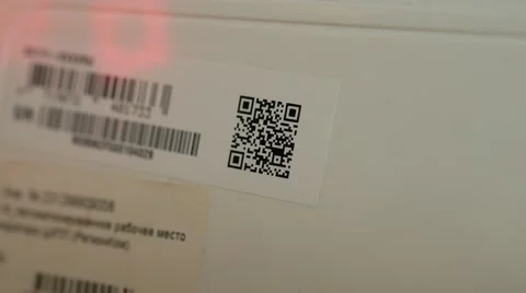 Close up of a 2d barcode reading with a barcode reader, 4k UHD 2160p, dolly Video stock 64774471
