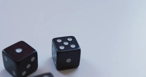 Close-up of 3 cubes lying on a flat surface. Prores 422. Stock Footage 167108374