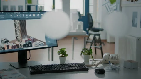 Close up of 3d building model on computer screen in empty office for Vídeos de archivo 166422025