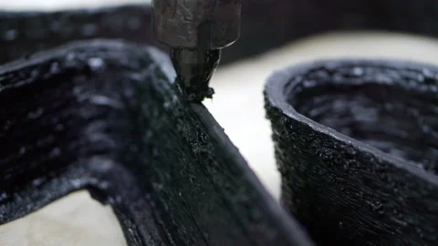 Close-up of a 3D printer in action. Stock Footage 251578890