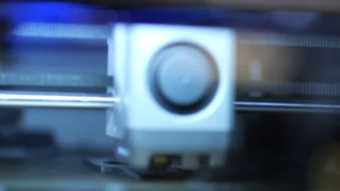 Close-up of 3D printer extruder during print job Stock Footage 345919034