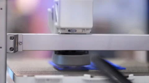 Close-up of 3D printer extruding material Stock Footage 345399183