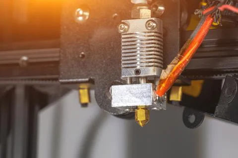 Close-up of a 3D printer printhead, hotend and extruder from a 3D printer Stock Photos