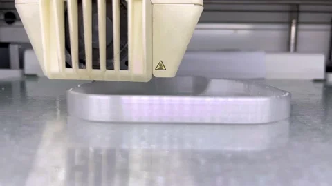 Close up of 3d Printer printing Stock Footage 216914006