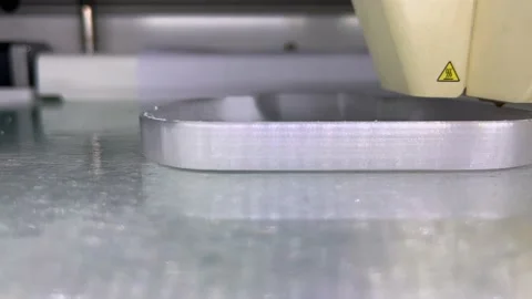 Close up of 3d Printer printing Stock Footage 216914015
