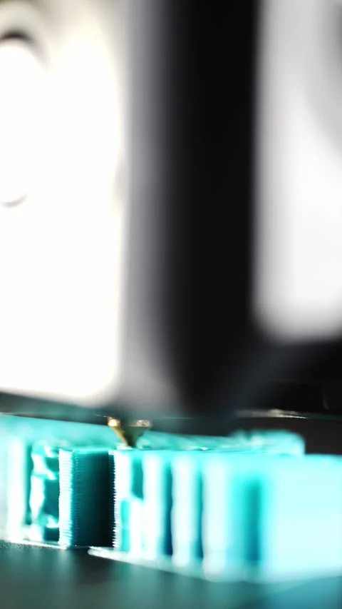Close-up of a 3D printer working while printing a plastic model. Stock Footage 321967695