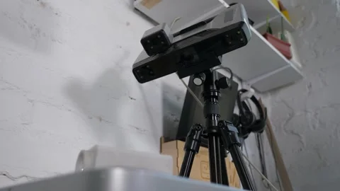 A close-up 3d scanner scans a plastic part for printing on a 3d printer. Stock Footage 250597389