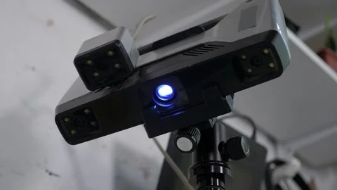 A close-up 3d scanner scans a plastic part for printing on a 3d printer. Stock Footage 287584759