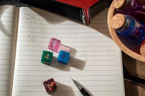 Close-up of 4 d6 dice for rolling game stats Stock Photos