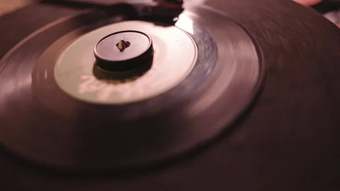 Close Up of a 45' Vinyl Record Spinning. Stock Footage 133998711