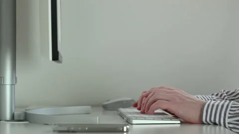 Close up 4K 60fps video of mans hands typing on keyboard befor computer worki Stock Footage 168439623