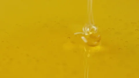 Close up 4k dolly shot, pour the honey onto the plate. Stock Footage 86470554