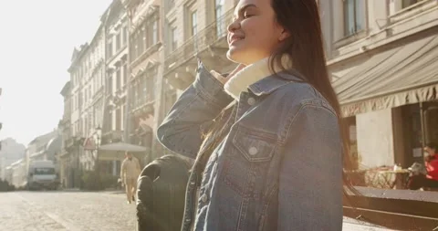 Close up 4k portrait of young dark haired woman on the street Stock Footage 144981690