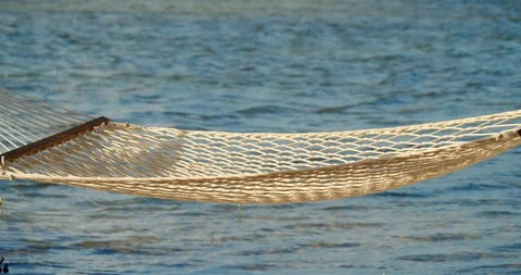 Close Up 4K Shot, Hammock With Ocean Behind Stock Footage 127643055