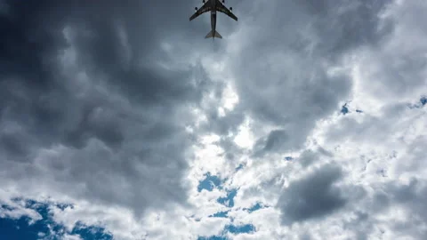 Close-up 4K time lapse video of white big clouds on a blue sunny sky. Summer Stock Footage 164710734
