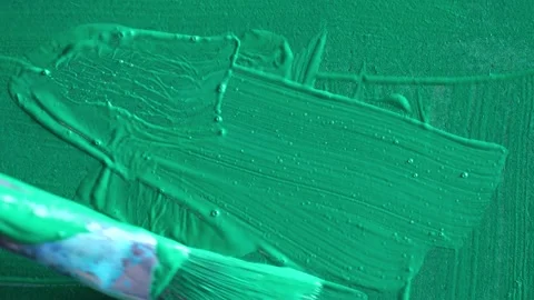 Close-up 4k video of artist hand painting with paintbrush Stock Footage 295782425