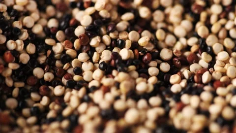 Close up 4K video of rotating quinoa seeds Stock Footage 147332652