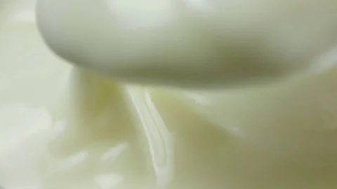 Close up, 4k video of scooping yogurt Stock Footage 84960971