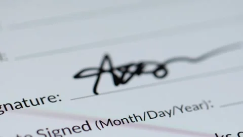 Close-up 4K video of a stylus pen writing a digital signature starting with the  Stock Footage 342778024