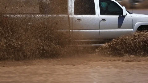 Close Up Of 4x4 Splashing Through Mud - Shallow Depth of Field Video stock 107074471